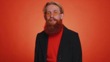 Greedy avaricious young redhead man showing refusal fig negative gesture, avaricious, acquisitive video