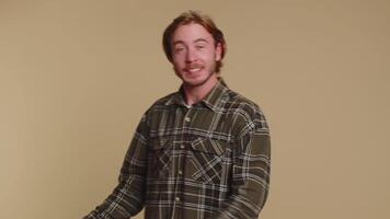 Man showing inviting gesture with hands, ask to join, beckoning to coming, gesturing hello goodbye video