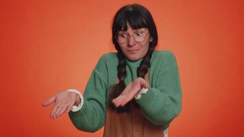 Woman raising hands asking what why reason of failure demonstrating disbelief irritation by troubles video