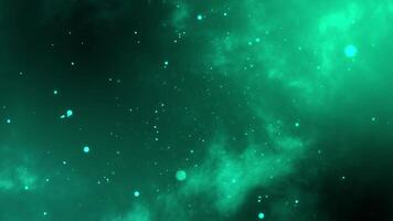 Teal particle and bokeh lights animation float against a dark, smoky background. video