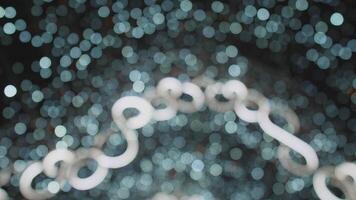 A mesmerizing and captivating abstract image showcasing elegant curves set against a sparkling bokeh background video