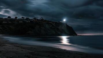 Long exposure of the beach at night in San Sebastian, Spain. photo