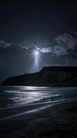 Lighthouse at the beach in Durdle Door, Dorset photo