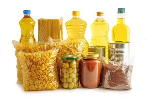 Foodstuffs in donation box isolated on white background for volunteer to help people. photo