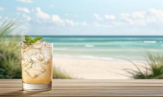 A refreshing cocktail on a wooden table with a beach view. photo