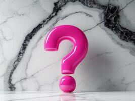 Glossy pink large question mark on a marble texture background photo