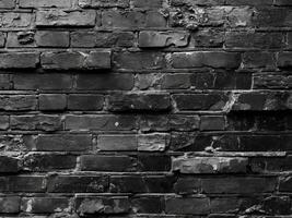 panoramic texture of black brick wall brickwork history for layout or backdrop.panoramic texture of black brick wall brickwork history for layout or backdrop. photo