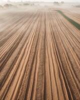 Aerial View of Cultivated Soil with Diffused Light photo