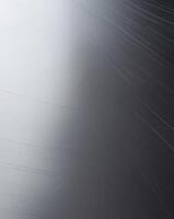 Brushed metal texture creating a gradient effect from light to dark photo
