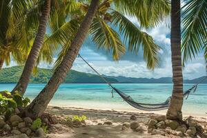 Hammock invites relaxation on a tranquil beach surrounded by palm trees and clear waters under a blue sky. photo