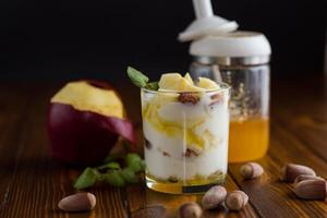 Natural delight with yogurt with honey and nuts photo