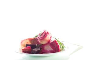 appetizer, pickled cabbage with beetroot, isolated on white background photo