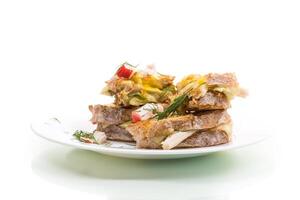Appetizing toasts with aromatic cheese, isolated on a white background photo