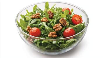 Crisp arugula salad topped with cherry tomatoes and walnuts, a perfect healthy delight. photo