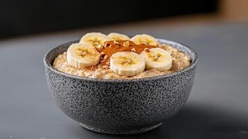 Healthy Food Revolution, Oatmeal with banana, almond butter, and a hint of cinnamon photo