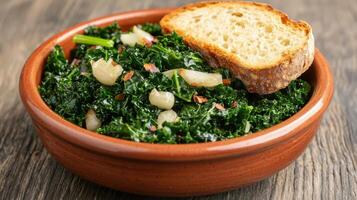 Healthy Food Revolution, Sauteed kale and garlic, paired with a slice of toasted sourdough bread photo
