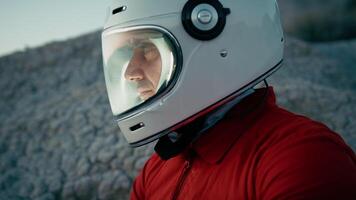 Astronaut With Helmet Looks Around And Opens Helmet Visor In New Planet video