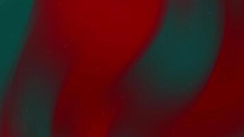 Red and teal gradient background features subtle dust particles. video