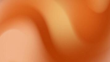 Orange abstract background features subtle swirling hues and tiny specks. video