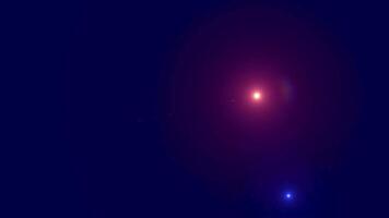 Motion Graphic Cosmic Glow A vibrant red starbursts with light against a deep blue backdrop, creating an otherworldly atmosphere of celestial wonder. video