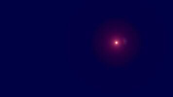 Motion Graphic Cosmic Bloom A vibrant, crimson light emanates from the center of a deep blue canvas, resembling a celestial bloom or distant star, creating a mystical and ethereal atmosphere. video