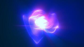 Glowing purple particles creating a floating sphere shape with intense light at its core, set against a deep violet video