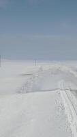 Working Grader in Snowy Asphalt video