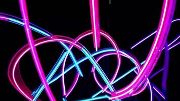 Seamless Loop of Glowing Neon Geometric Shapes on Dark Background video
