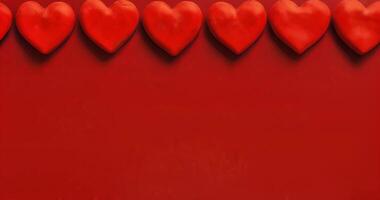 Red textile hearts on paper monocolor background. Happy Valentine's Day top view greeting card with copy space for text. Hearts frame abstract background, flat lay. Hearts Love pattern video