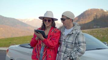 travelers using electronic map in tablet, navigating by online application, carefree tourists video