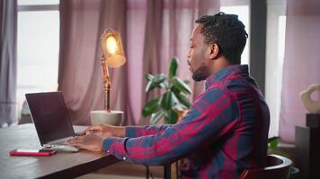 online communication by call in laptop, freelancer man use it for talking with colleagues video