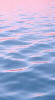 Gentle water ripples reflecting soft pastel colors, creating a dreamy and dynamic background. video