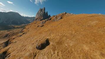 Smooth flight along the mountain range, filmed by FPV drone. Seceda, Italy video