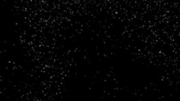 shows a serene black background with falling snowflakes and stars. Motion video