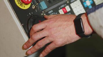 Operator is responsible for adjusting the machinerys intricate control panel settings. Media video