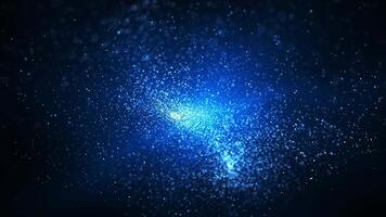 Abstract background of magic particles in blue color, particles glow and move with wave energy, nebula video