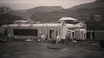 Colonist base built on a distant planet surrounded by rugged terrain video