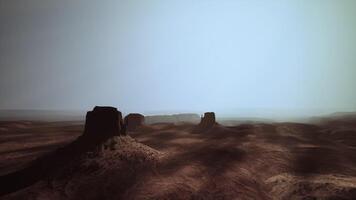 Mysterious landscape with giant rock formations in desert at dusk video