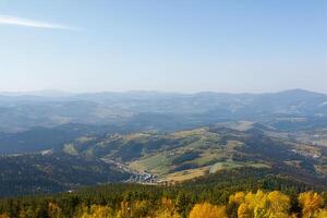 Autumn landscape with mountains and trees photo