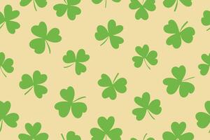 Seamless pattern of clover leaves for St. Patrick's Day. Clover leaves in flat style on yellow background. Suitable for wrapping paper, wallpaper, background, card and decoration. vector