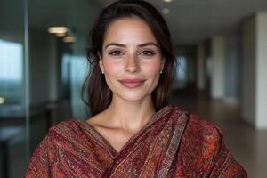Portrait of a smiling woman wearing a patterned shawl photo