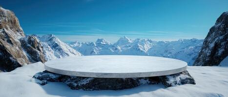 Empty round podium on snowy mountain top with scenic view photo