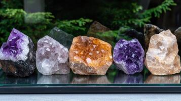 Amethyst, quartz, and citrine geode clusters on display photo