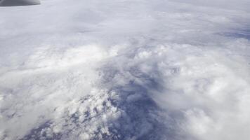 Aerial view of fluffy clouds at high altitude under a serene sky. Peaceful horizon, dreamy atmosphere, breathtaking cloudscape, tranquil perspective, and scenic natural beauty. video