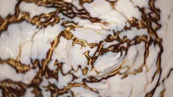 Swirling Cream and Gold Patterns Footage Captured in Close-Up Shot video