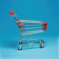 Empty shopping cart against a bright blue background, highlighting its sleek metallic design. photo