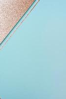 Elegant abstract design with glittering gold and light blue geometric shapes. photo