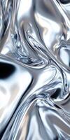 Abstract wavy metallic surface reflecting light in a fluid motion. photo