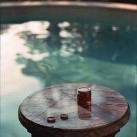 A jar of honey on a marble table by a serene poolside, capturing a tranquil moment. photo