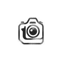 Camera icon in halftone style black and white vector